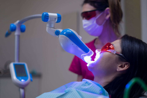 Effect of Er: YAG Laser on Microtensile Bond Strength of Bleached Dentin to Composite 