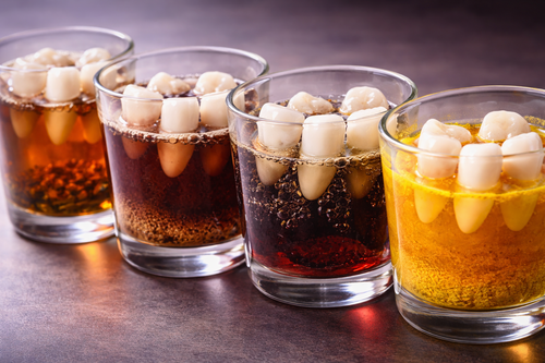 Color Stability of Different Denture Teeth Following Immersion in Staining Solutions